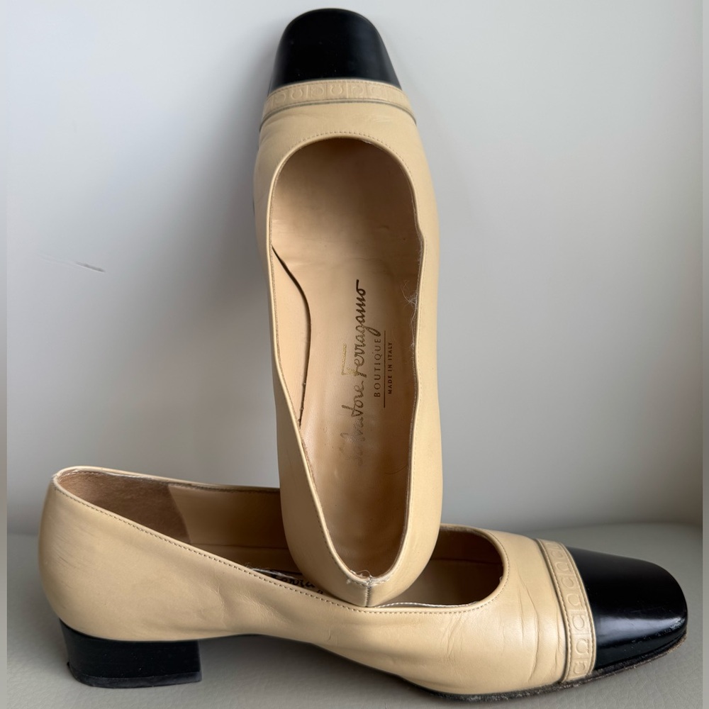 Salvatore Ferragamo Tan Leather Flats with Black Toe and logo trim detail